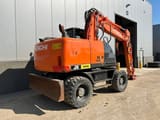2015 Hitachi ZX140W-5 wheel excavator, rear three-quarter view