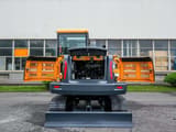 2026 Hyundai HG60 mini excavator rear view with engine compartment open
