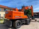 2014 Doosan DX170W wheel excavator, rear three-quarter view