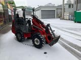 2010 Weidemann 1250 CX 35 mini excavator, three-quarter front view