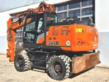 2024 Hitachi Zaxis 180W wheel excavator, rear three-quarter view
