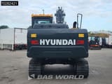 Rear view of a 2025 Hyundai HX130 N crawler excavator