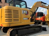 2024 Caterpillar 306E2 crawler excavator, rear three-quarter view