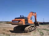 Doosan DX520LC-9C crawler excavator, rear three-quarter view