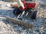 2021 Takeuchi TB216 mini excavator front view with blade