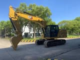 2018 Caterpillar 320GC excavator side view