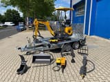 Berger Kraus BK1000JS mini excavator on trailer with attachments