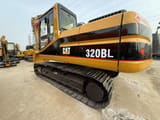 2013 Caterpillar 320BL crawler excavator, rear three-quarter view