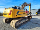 2015 Liebherr R920 crawler excavator rear three-quarter view