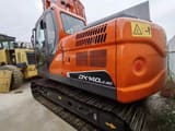 2019 Doosan DX140LC-9C crawler excavator, rear three-quarter view