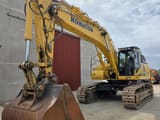 2018 Komatsu PC490LC crawler excavator, front three-quarter view