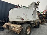 2005 CASE WX165 wheel excavator, rear three-quarter view