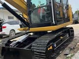 2024 Caterpillar 307E2 excavator front three-quarter view