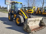 2019 JCB 409 wheel loader, front three-quarter view