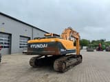 2011 Hyundai R250NLC-9 crawler excavator, rear three-quarter view