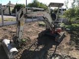 2012 Takeuchi TB219 mini excavator, front three-quarter view
