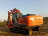 2023 Hitachi Zaxis 210 crawler excavator, rear three-quarter view