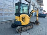 2014 Komatsu PC26MR mini excavator, rear three-quarter view