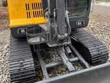 2023 Volvo EC60D crawler excavator, front view of the undercarriage and blade