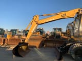 2000 Caterpillar M315 wheel excavator, side profile view
