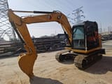 2024 Caterpillar 307E2 mini excavator, side view