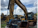 2022 Caterpillar 320GC crawler excavator, front three-quarter view