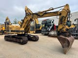 Caterpillar 211BLC crawler excavator, rear three-quarter view