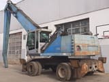 2011 Fuchs MHL350D material handler, side view