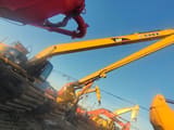 2019 Caterpillar 320C amphibious excavator, side view