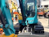 2015 Kubota KX161-3SZ mini excavator, front view with blade