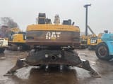 2005 Caterpillar M322C material handler rear view