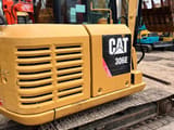 2022 Caterpillar 306E excavator, rear three-quarter view