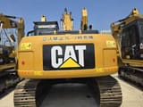 2023 Caterpillar 323DL crawler excavator, rear view