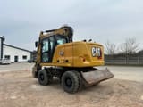 2021 Caterpillar M314 wheel excavator rear three-quarter view