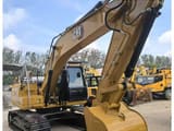2022 Caterpillar 320GX crawler excavator, front three-quarter view