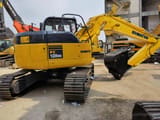2018 Komatsu PC128US mini excavator rear three-quarter view