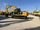 2012 Caterpillar 323DL crawler excavator, side profile view