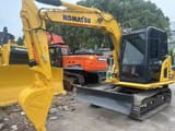 2024 Komatsu PC70-8 mini excavator, front three-quarter view
