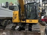 2016 Caterpillar 315FLCR crawler excavator front view with blade
