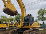 Komatsu PC350 crawler excavator, side view with raised bucket