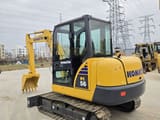 2023 Komatsu PC56 mini excavator, rear three-quarter view