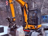 2014 Wacker Neuson 6503-2 wheel excavator, front three-quarter view