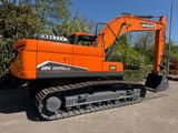 2025 Develon DX 225LC-7M crawler excavator, rear three-quarter view