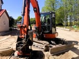 2020 Kubota KX057-4 mini excavator, front three-quarter view