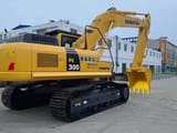 Komatsu PC300 crawler excavator, rear three-quarter view