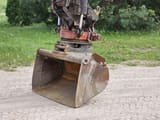 1996 Atlas 1304KZW wheel excavator bucket attachment