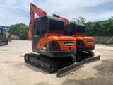 2022 Doosan DX60-9C crawler excavator, front three-quarter view