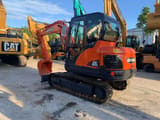 2021 Doosan DX60 mini excavator, rear three-quarter view