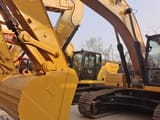 2024 Caterpillar 320GC crawler excavator, close-up view