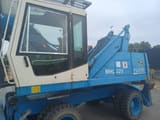 2003 Fuchs MHL320 wheel excavator side view